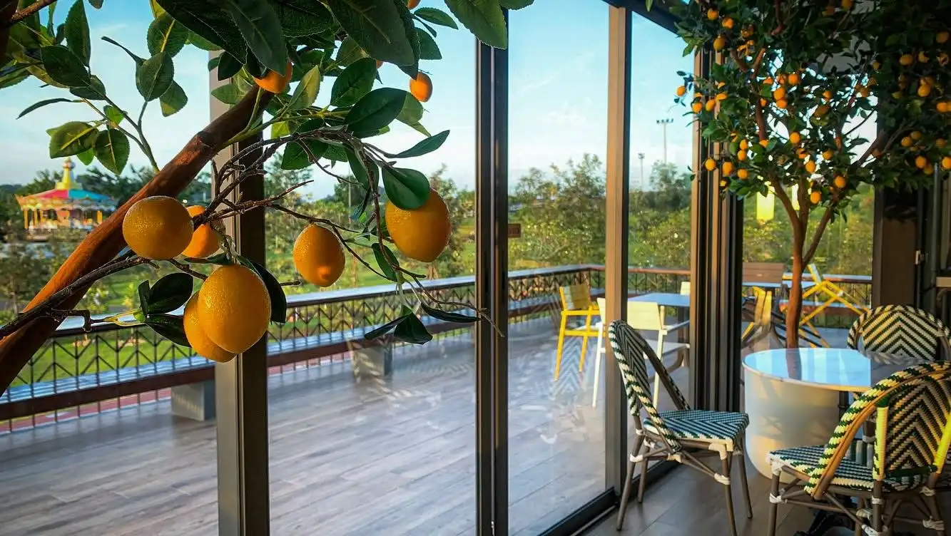 Outdoor garden terrace seating among flowers